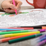 Coloring book and color felt-tip pens