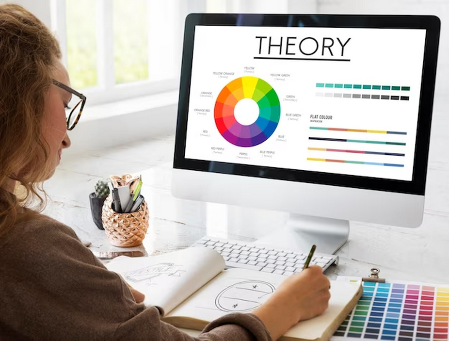 Woman working on color theory with a computer.