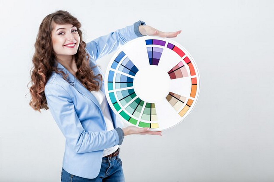 Woman holding a color wheel